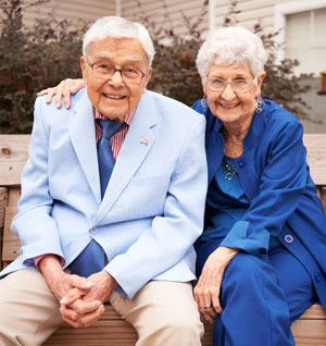 Older couple sitting outside