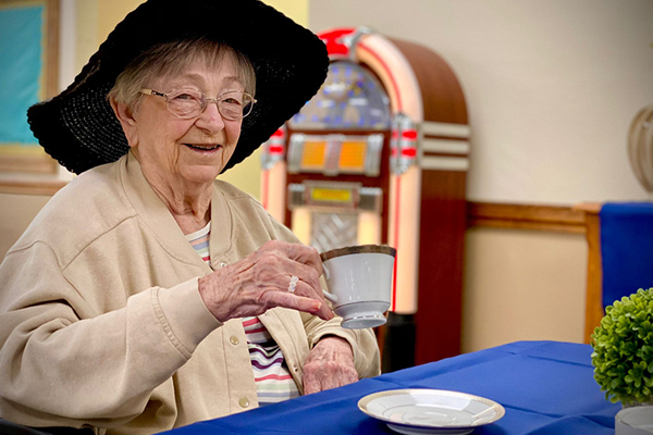 Older woman enjoying tea