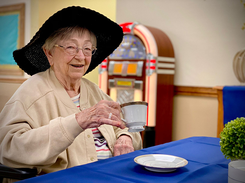 Older woman enjoying tea